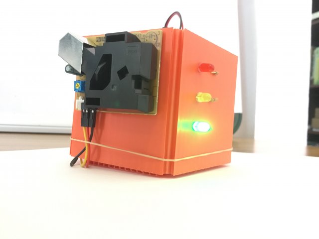 A fully assembled particle sensor. The handheld device introduces students to data collection by allowing them to measure particulates in the air.