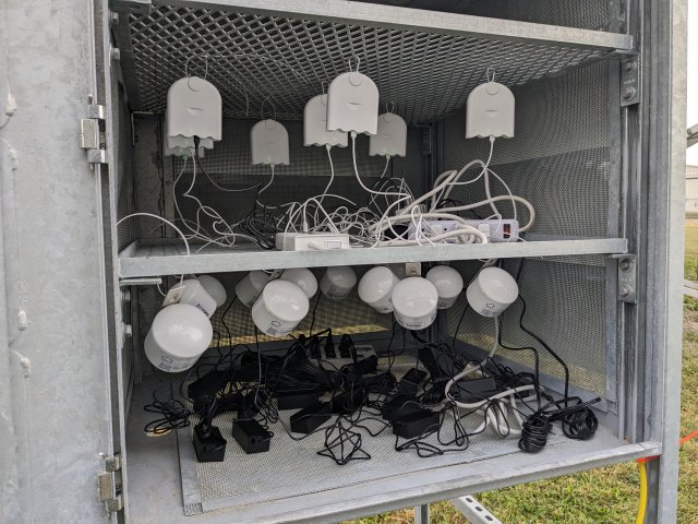 Various PM sensors in the collocation shelter being collocated by users for calibration prior to deployment.